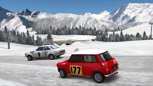 Pocket Rally LITE: a red classic hatchback on a snow stage below a mountain ridge